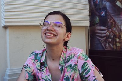 Portrait of smiling man wearing sunglasses