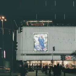 Blurred motion of people in city at night