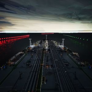 High angle view of illuminated bridge in city against sky