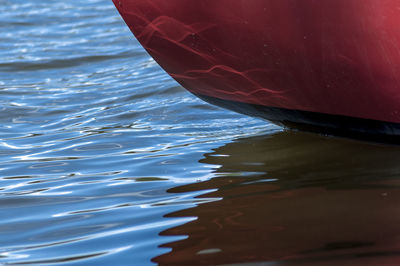 High angle view of red boat in lake