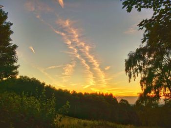 Scenic view of landscape against sky during sunset