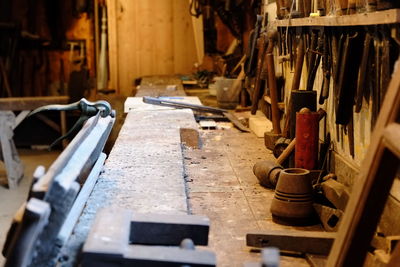 Workbench with hand tools in workshop