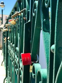 Close-up of clothes hanging on metal