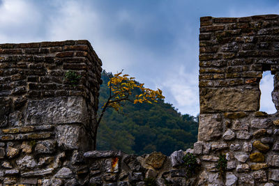 Low angle view of old building against sky