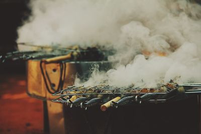 Close-up of food roasting on barbecue grill