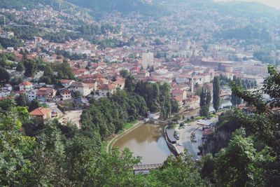 High angle view of townscape and trees in city