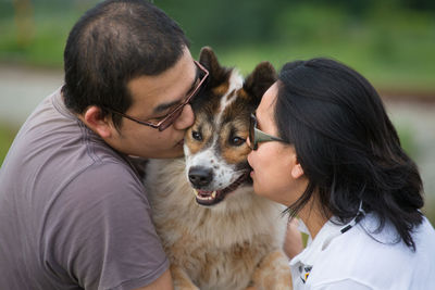 Rear view of woman with dog