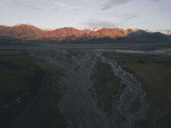 Scenic view of landscape against sky during sunset