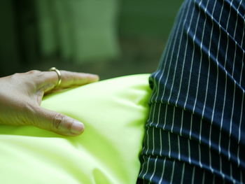 Close-up of hand against blurred background