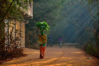 A vegetable seller was going to sell crop at near by market in morning