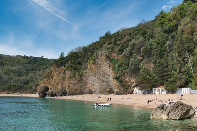 Scenic view of sea against mountain