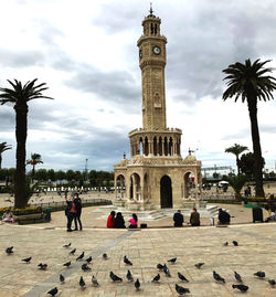 Group of people in front of historical building