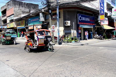 Jinrikisha on city street