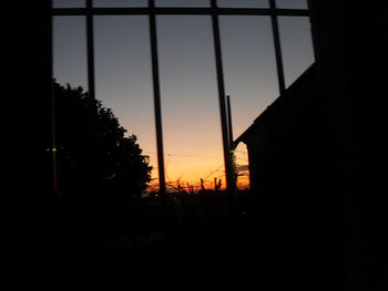 View of built structures at sunset