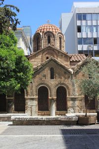 Facade of temple against building