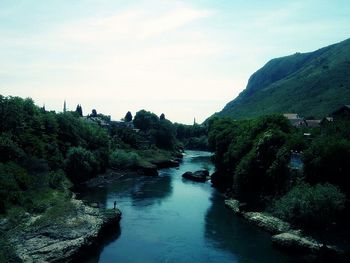 Scenic view of river against sky