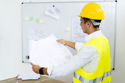 Man working with umbrella