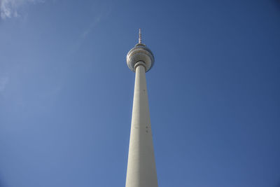 Low angle view of communications tower against clear sky