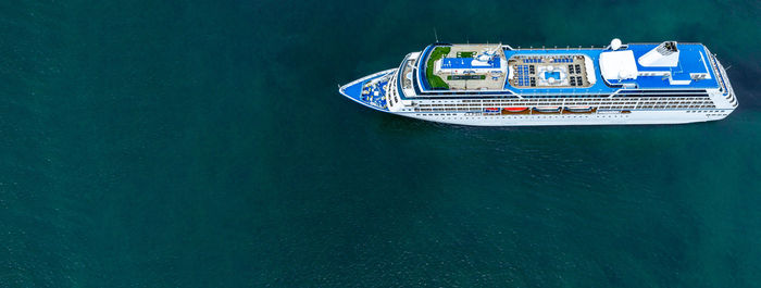 Aerial view cruise ship liner on ocean sea, luxury cruise ship liner modern maritime travel