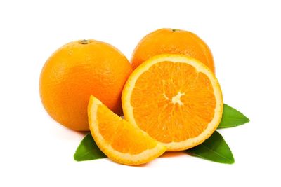 Close-up of orange against white background