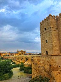 Arch bridge against sky