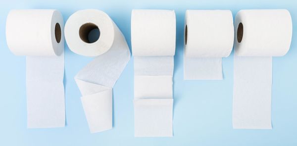 High angle view of papers on white table