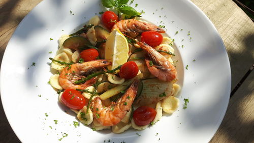 High angle view of salad in plate on table