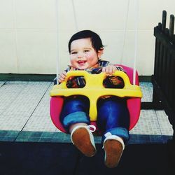 Portrait of smiling boy playing