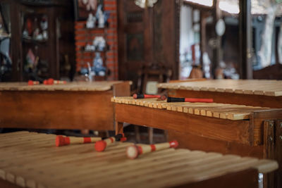 Close-up of piano on table