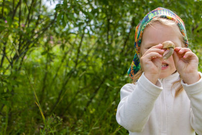 Portrait of girl with plants