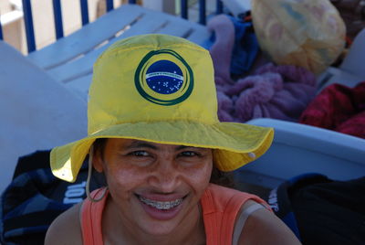 Close-up portrait of happy woman with braces