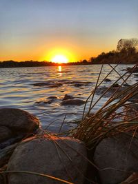 Scenic view of sea against sky during sunset