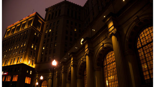 Low angle view of illuminated building at night