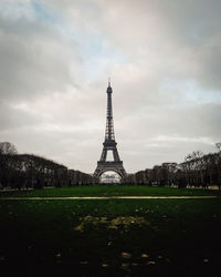 View of tower against cloudy sky