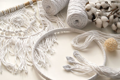 High angle view of rope tied on table