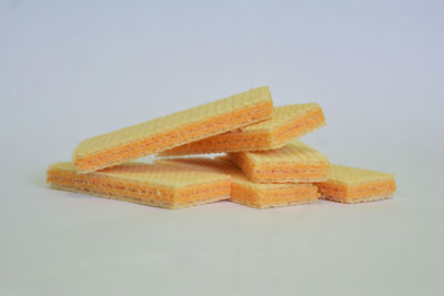 Close-up of cake against white background