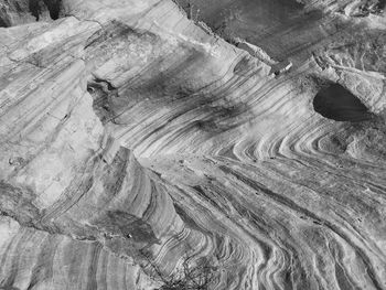 Black and white close up of striped boulders