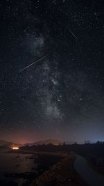 Scenic view of star field against sky at night