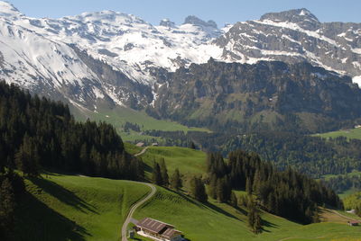 Scenic view of landscape and mountains against sky