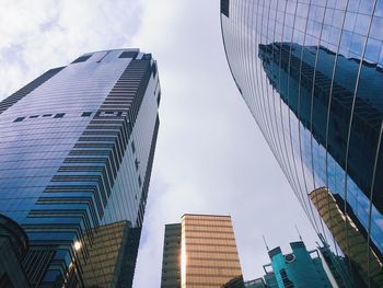 Low angle view of skyscrapers in hong kong