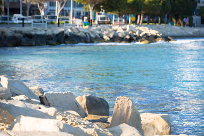 Close-up of rocks by sea