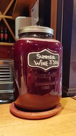 Close-up of drink in glass jar on table