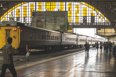 People at railroad station
