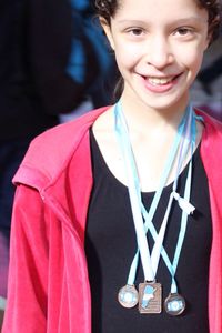 Portrait of girl wearing medals