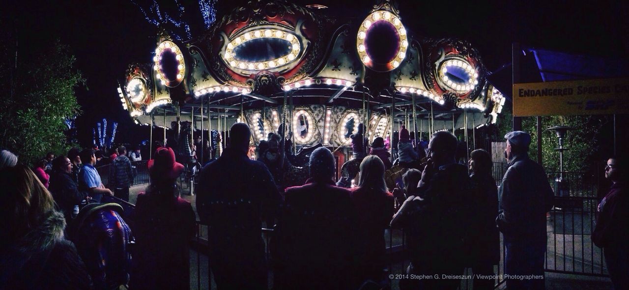 large group of people, crowd, illuminated, men, person, arts culture and entertainment, lifestyles, leisure activity, night, music, tourism, religion, famous place, celebration, cultures, spirituality, place of worship, enjoyment, indoors