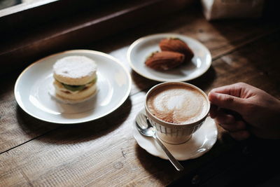 High angle view of coffee cup on table