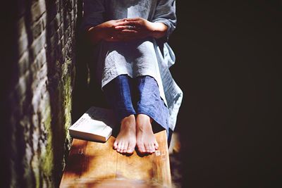 Close-up of woman standing in pond