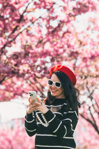 Young woman using mobile phone