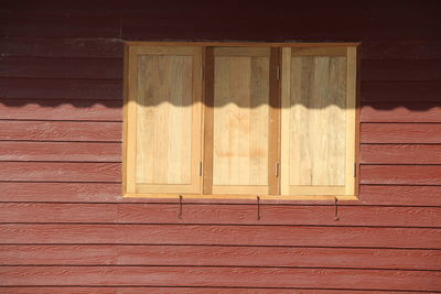 Closed wooden door of building