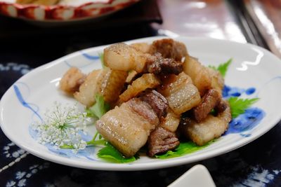 Close-up of meat in plate on table